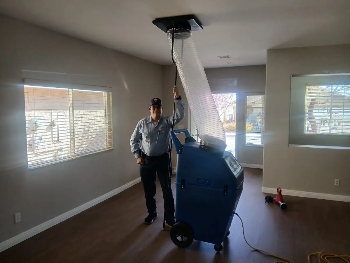Professional Dryer Vent Cleaning work inside a Bright home